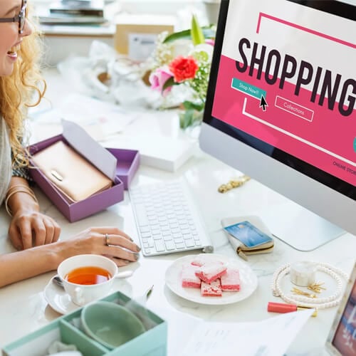 Asian Web Designer Showing the client an E-Commerce Website