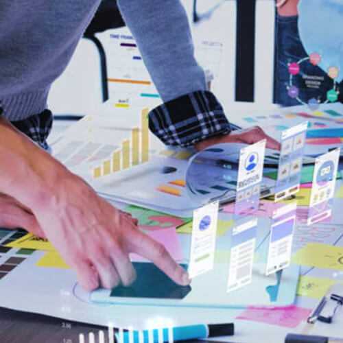Singaporean UX Designers Planning Website User Interface