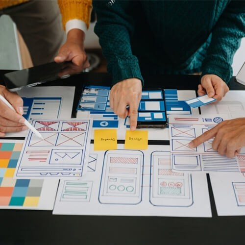 Web Designers Creating Website Wireframe