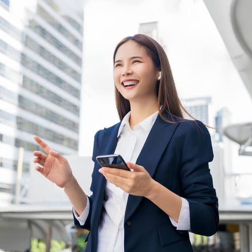 Singaporean Business Woman Using Smartphone