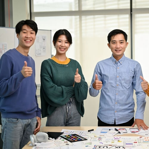 Team of Smiling Singaporean Web Designers