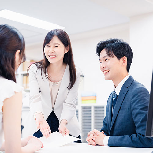 staff from a managed it service provider in Singapore talking
