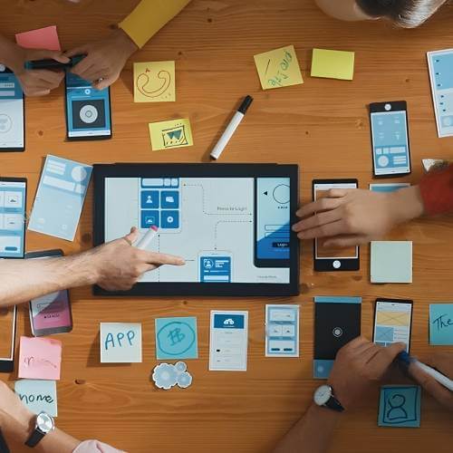 Singaporean Website Designers Working On Scrolling Animations at the Office