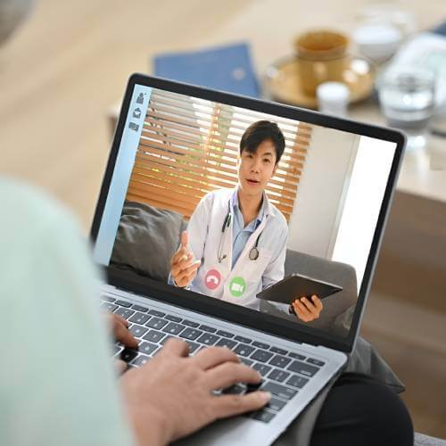 Singaporean Patient Using Online Consultancy System Designed By Web Design Company For Healthcare