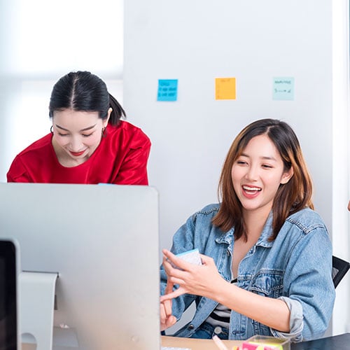 three professionals working to provide affordable web design services
