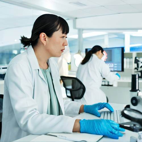 Singaporean Pharmacist Using A Web Platform Created By A Website Developer For Pharmaceutical Company